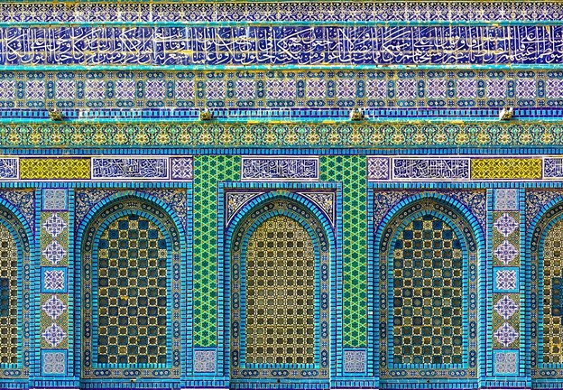 Dome of the Rock. Detail of ceramic tiles with geometric patterns and calligraphy at the top.