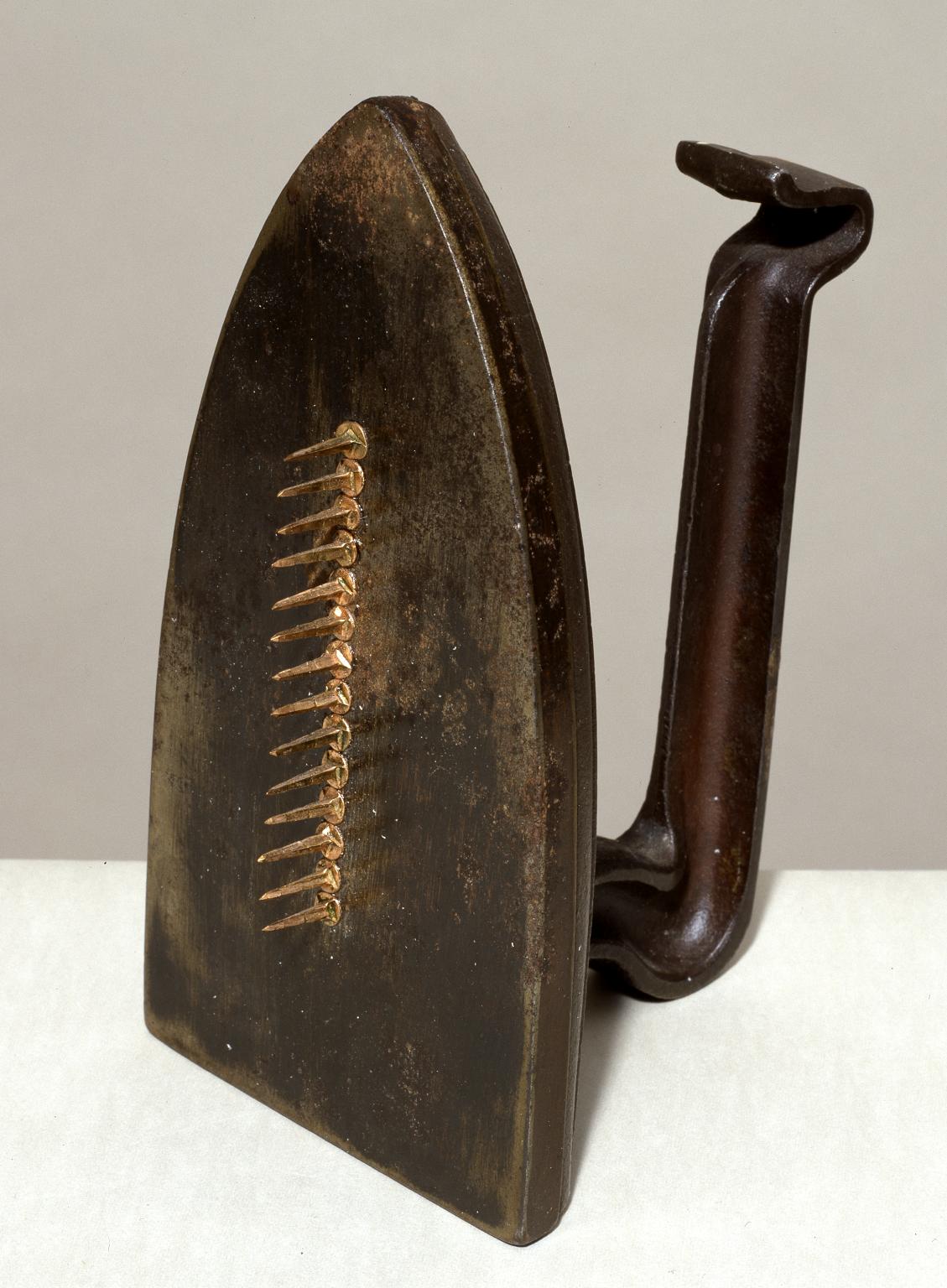 Man Ray, Cadeau, 1921, editioned replica 1972, assemblage, 17 × 9 × 12 cm, Tate Gallery, London
