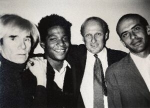 Andy Warhol avec Jean-Michel Basquiat, Bruno Bischofberger, et Francesco Clemente, en 1984.