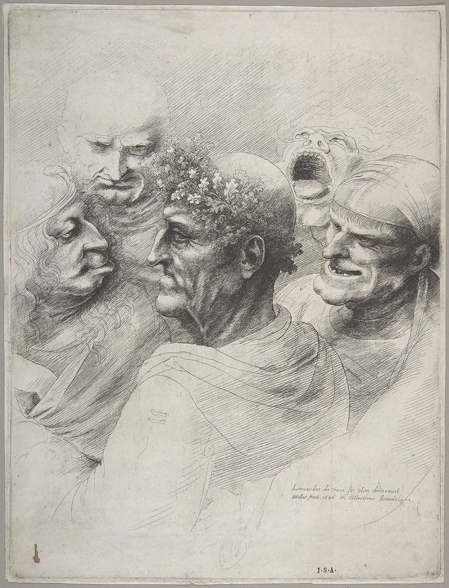Five grotesque heads, including an elderly man with an oak leaf wreath